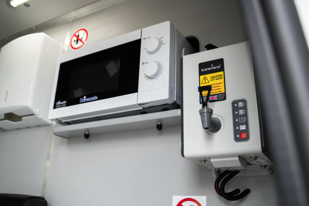 microwave and water boiler in a welfare van