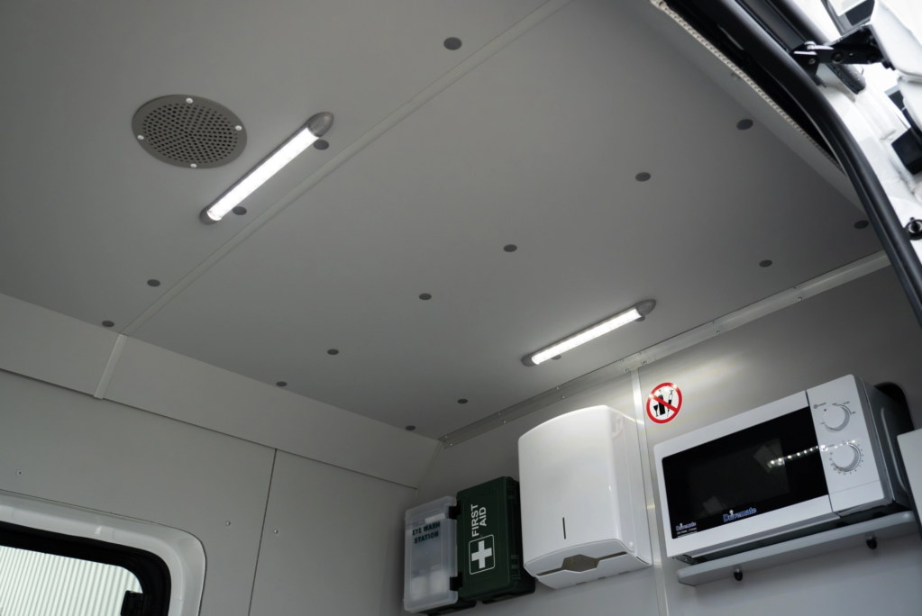 Microwave and first aid station in a welfare van