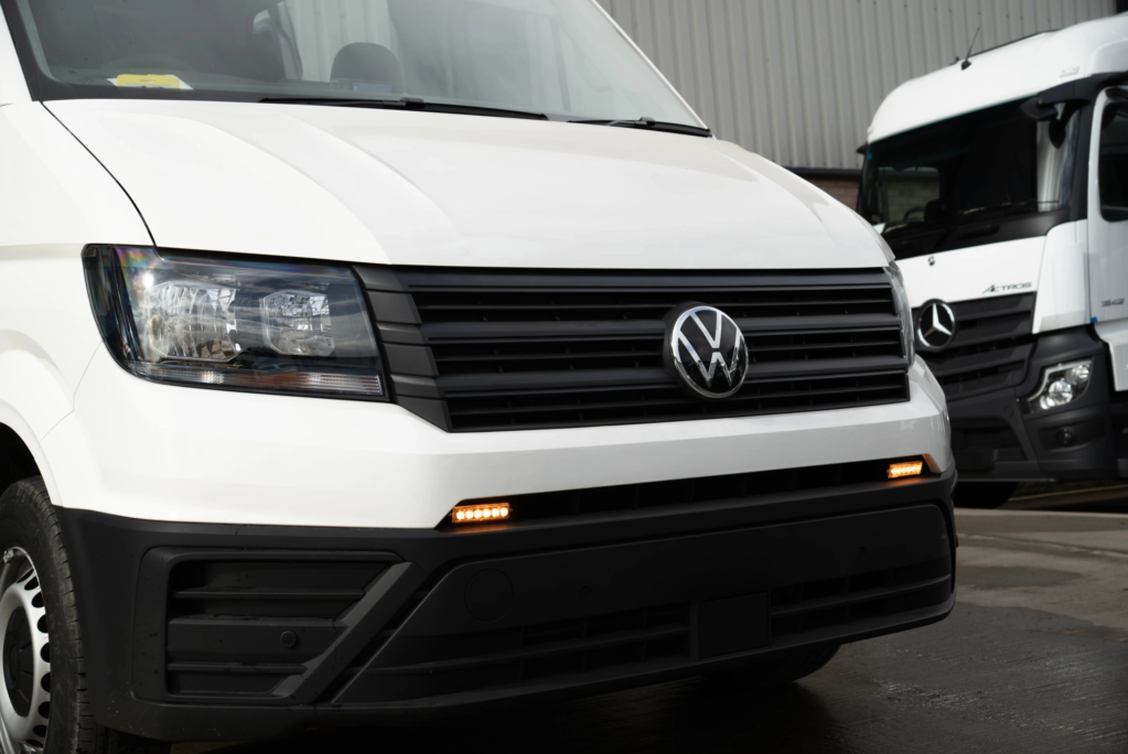 strobe lights on the front of a welfare van